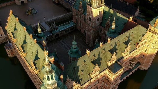 Aerial of a castle at dusk in Hillerod Denmark