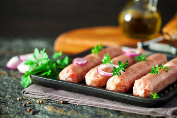 Kupaty - raw shashlik sausage of pork barbecue, grill. Raw sausage for grill.  Picnic. Selective focus.