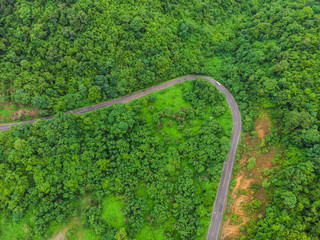 aerial view of forest road in mountain