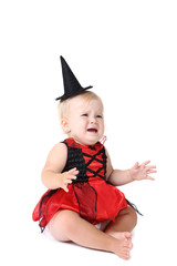 Baby girl in halloween costume on white background