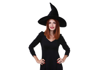 Beautiful redhaired woman in halloween costume isolated on white background