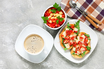  bruschetta with  tomatoes, mozzarella cheese and herbs