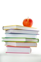 Red Aplle on Stack of Books