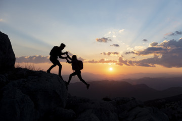 support in unity and togetherness, cooperation and challenging stages in mountaineering