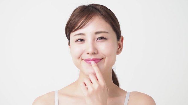 attractive asian woman skincare video footage