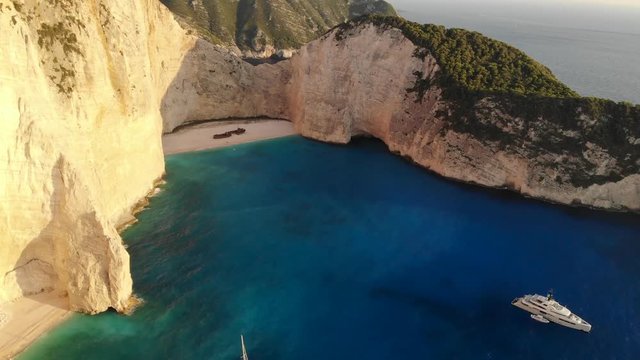 Shipwreck Beach also known as Navagio Beach or Shipwreck Cove, located in Zante, Zakynthos island in Greece. Drone footage is from DJI Mavic Air shot during the day and golden hour and sunset.