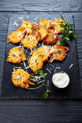 Homemade pumpkin fritters with cheese, vertical