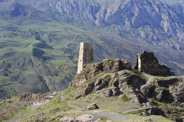Fototapeta na wymiar Ancient mountain fortress in the Caucasus Mountains