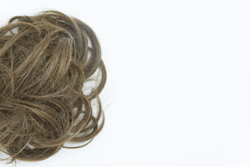 Curly hair isolated on white background. Right copy space.