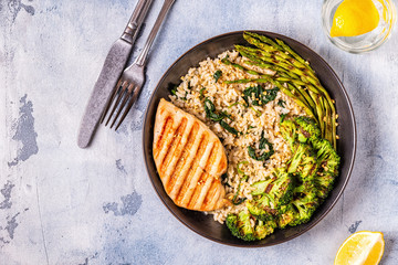 Grilled chicken breast with brown rice, spinach, broccoli, asparagus