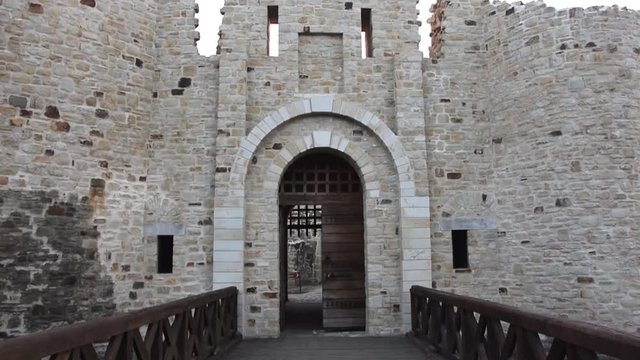 Tilt up on a castle gate, wall, battlement and parapet.