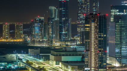 Fototapeta na wymiar Aerial skyline of Abu Dhabi city centre from above night timelapse