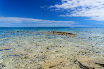 Fototapeta na wymiar Rocky beach off the coast Fiji