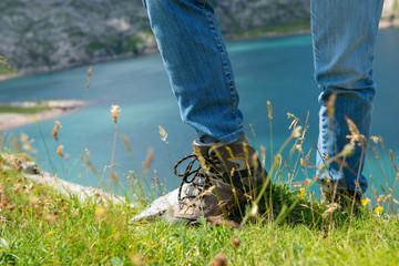 close-up of woman hiker's foots in the mountain