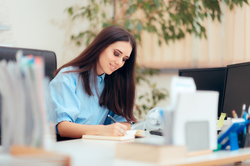 Female Desk Job Office Employee Working To Complete Tasks  