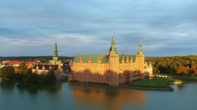Aerial of a castle at dusk in Hillerod Denmark