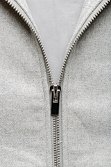 silver zip on woolen fabric