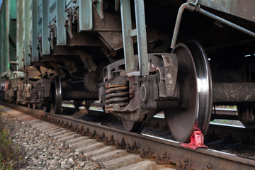 Fototapeta premium red railway brake shoe stops the train