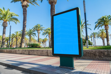 Outdoor billboard advertisement in seaside resort city mockup