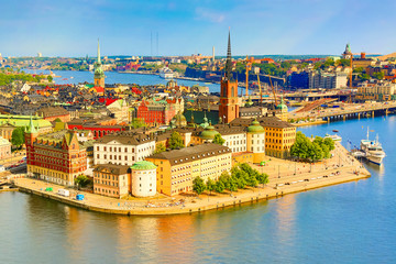 Fototapeta na wymiar Gamla Stan, the old part of Stockholm in a sunny summer day, Sweden. Aerial view from Stockholm City hall Stadshuset.