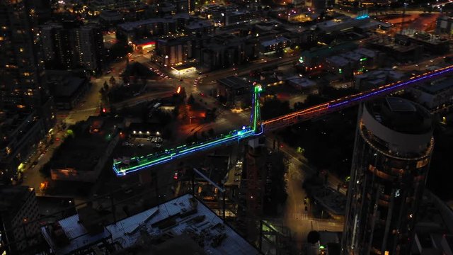 Crane illuminated with neon lights Seattle downtown 4k