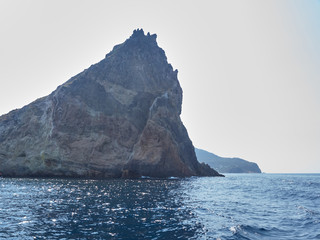 Fototapeta na wymiar View from boat of the island in the nearbies of Panarea: Lisca Bianca and Basiluzzo