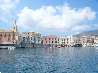 Fototapeta na wymiar Shot of Lipari's Marina Corta from boat during a sunny day