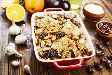 Chicken thigh baked with rice, eggplant and figs