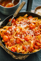 Tomato sauce spaghetti pasta on pan