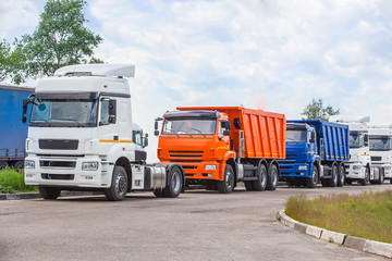 trucks in the Parking lot near the highway