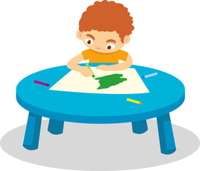 A child paint on the table