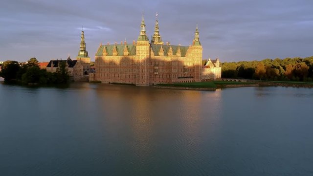 Aerial of a castle at dusk in Hillerod Denmark