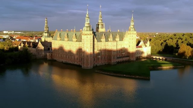 Aerial of a castle at dusk in Hillerod Denmark