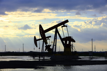 in the evening, oil pumps are running