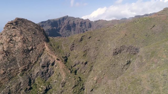 Aerial - Flying near typical rocky hills close to Masca town in Tenerife