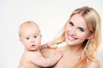 smiling mom and baby