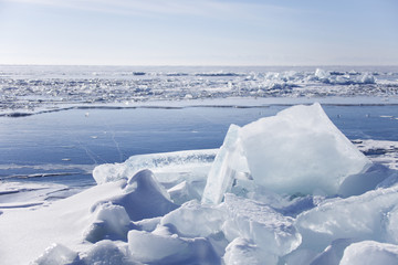 Fototapeta na wymiar Winter landscape of Lake Baikal. Ice floes