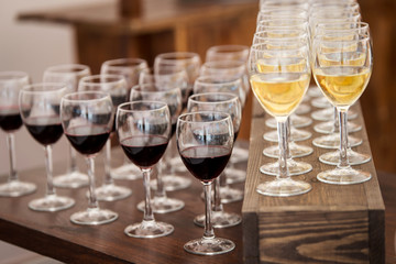 Set of wine and juice glasses on the banquet