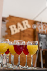 Set of wine and juice glasses on the banquet