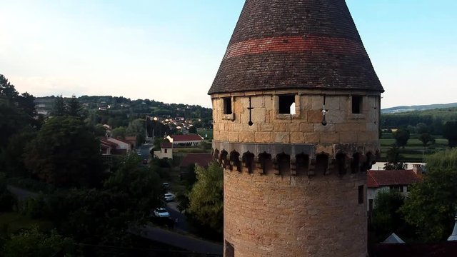 Downwards shot of castle tower in small town Cluny, in France.