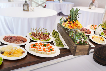 Snacks on served banquet table