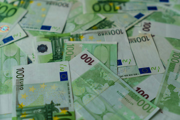 texture of many lying hundred euro banknotes, european union money