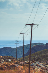 High voltage towers in mountains