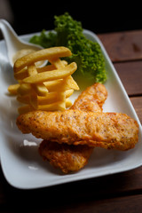 Food photography close up english style fish and chips with vegetables