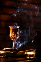 Studio shot of beverage with smoke effect