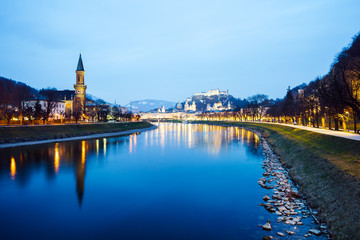 Fototapeta premium Beautiful illuminated cityscape over Salzburg, Austria