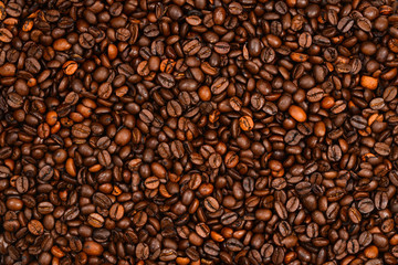 Coffee beans background. Top view. Coffee beans texture.