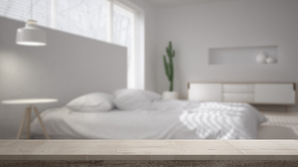Fototapeta na wymiar Wooden vintage table top or shelf closeup, zen mood, over blurred modern scandinavian bedroom, white architecture interior design