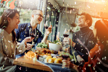 happiness friends christmas eve celebrate dinner party with food wine and laugh together with joyful moment - obrazy, fototapety, plakaty