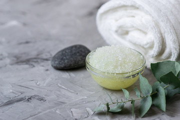 Fototapeta na wymiar Natural Ingredients Homemade Body Sea Salt Scrub with Olive Oil White Towel Beauty Concept Skincare Organic Aroma Spa Therapy
